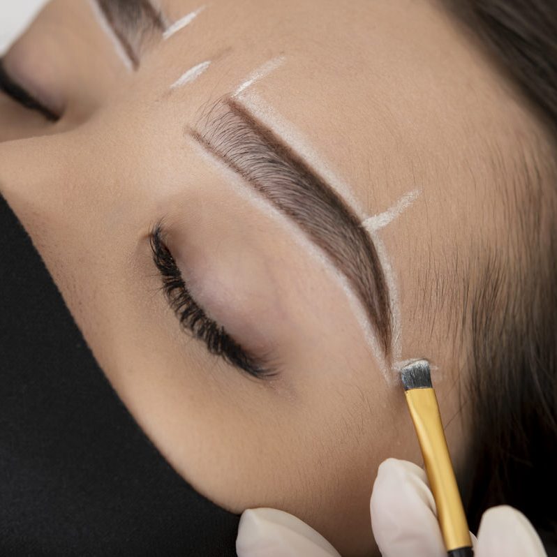 beautician-working-client-s-eyebrows